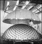 the two dome sections of the S-IVB's common bulkhead are being precisely fitted before insulation is applied between them
