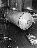 a completed S-ll stage rolls out of the Seal Beach facility during the night shift