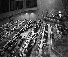 Computers and their end product devised for Saturn V-automatic checkout of flight hardware-were much in evidence at the Kennedy Space Center. This view of the control center, with row on row of computer consoles, is only one portion of the system.