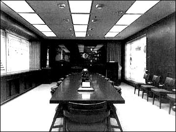 MSFC's Saturn V Program Office operated out of this Program Control Center, rimmed with recessed, sliding status charts and double picture screens for comprehensive, up-to-the-minute briefing on progress and problems in the farflung program.