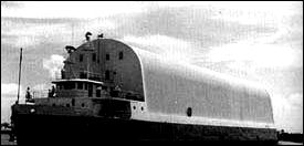 The barge Poseidon ferried S-IC and S-ll stages between MSFC, Michoud, Mississippi Test Facility, and KSC.