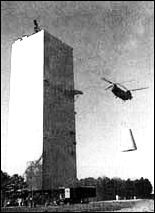 an Army CH-47A helicopter arrives at the MSFC dynamic test stand with the Saturn IB adapter unit it has flown 970 kilometers from Tulsa, Oklahoma