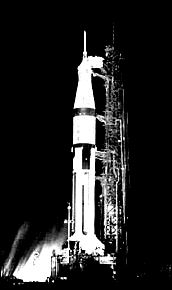 the first manned Saturn IB, Apollo 7, is shown or the launch pad at night, poised for takeoff the next day, 11 October 1968