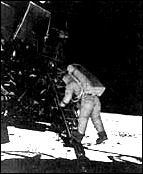 Astronaut Edwin E. Aldrin, Jr., is photographed by fellow astronaut Neil A. Armstrong as he prepares to take his first step onto the lunar surface