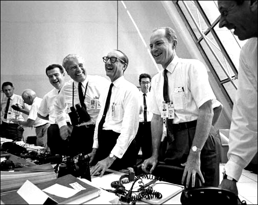 Apollo 11 mission officials relax in the Launch Control Center at the Kennedy Space Center following the successful Apollo 11 liftoff. From left to right are: Charles W. Mathews, Dr. Wernher von Braun, Dr. George E. Mueller and General Samuel C. Phillips.