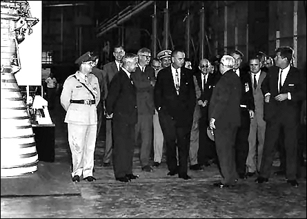 NASA Administrator James E. Webb, second from right, touring Marshall Space Flight Center with President John F. Kennedy, Vice President Lyndon Johnson, and other guests on September 11, 1962